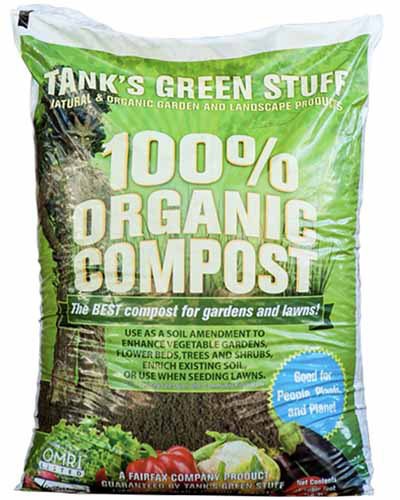 Un gros plan d'un sac de comptages verts de Tank's Green 100% bio isolés sur un fond blanc.